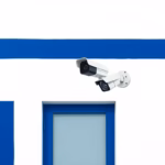Suprematist abstract painting by Kazimir Malevich featuring a modern outdoor security camera mounted on a house wall. Minimalist composition of bold navy blue and vibrant yellow geometric shapes on a stark white background. Flat textures, sharp edges, avant-garde electrical concept. ##no humans##, ##no text##