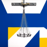 Suprematist abstract painting in the style of Kazimir Malevich featuring a heavy crystal chandelier hanging from a geometric ceiling anchor plate with bolts and an independent safety cable. Minimalist composition of bold navy blue and vibrant yellow geometric shapes on a stark white background. Flat textures, sharp edges, avant-garde electrical concept. No humans, no text overlay.