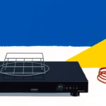 Suprematist abstract painting by Kazimir Malevich featuring a sleek black induction cooktop with a coiled copper power cable and a stack of squared oven racks. Minimalist composition of bold navy blue and vibrant yellow geometric shapes on a stark white background. Flat textures, sharp edges, avant-garde electrical concept. No humans, no text.