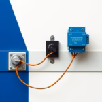 Suprematist abstract painting by Kazimir Malevich featuring an antique bakelite toggle switch being rewired with copper wires and a modular impulse relay clipped on a DIN rail. Minimalist composition of bold navy blue and vibrant yellow geometric shapes on a stark white background. Flat textures, sharp edges, avant-garde electrical concept. ##no humans##, ##no text##.