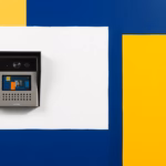 Suprematist abstract painting inspired by Kazimir Malevich, featuring a minimalist outdoor intercom entry panel and an indoor video monitor, bold navy blue and vibrant yellow geometric shapes on a stark white background, flat textures, sharp edges, avant-garde electrical concept, no humans, no text, no letters, no numbers.