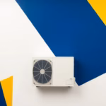 Suprematist abstract painting by Kazimir Malevich featuring a decommissioned oil boiler transforming into a sleek air-water heat pump unit with radiating warmth lines. Minimalist composition of bold navy blue and vibrant yellow geometric shapes on a stark white background. Flat textures, sharp edges, avant-garde electrical concept. No humans, no text, no lettering, no overlay.