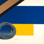 Suprematist abstract painting by Kazimir Malevich featuring old fabric-insulated electrical wires coiled beside rolls of attic insulation under a sloped roof. Minimalist composition of bold navy blue and vibrant yellow geometric shapes on a stark white background. Flat textures, sharp edges, avant-garde electrical concept. No humans, no text overlay.